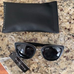 Quay sunglasses, tags on, never worn.